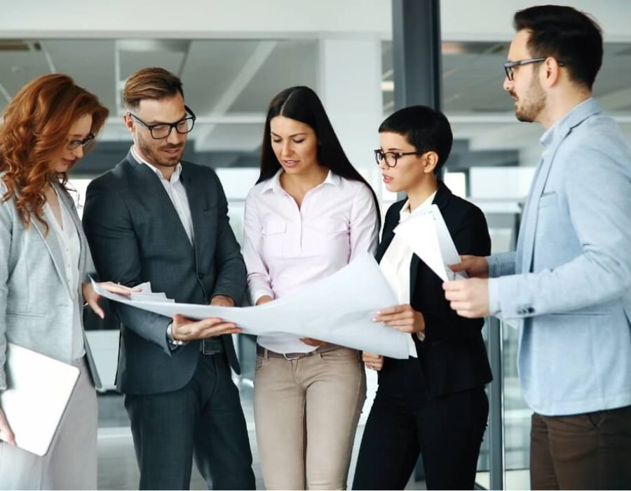 Corporate Teamworking Colleagues In Modern Office Ktxs67w.jpg